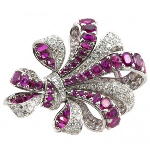 Vintage Ribbon Platinum Brooch with 10 Carats of Rubies and 8 Carats of Diamonds